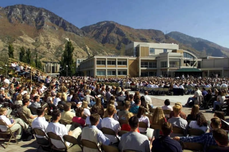 In this 1999 file photo, thousands listen as President Gordon B. Hinckley speaks at the rededication of BYU's Ernest L. Wilkinson Student Center. Demolition crews began removing an east-facing portion of the Wilkinson Center on Wednesday May 15, 2013. The