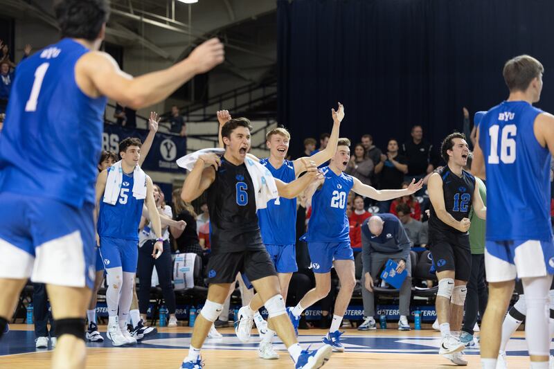 BYU volleyball players celebrate after winning during a match at the Smith Fieldhouse in Provo on March 10, 2023.