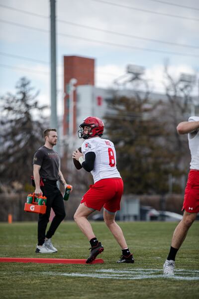 Utah quarterback Brandon Rose throws