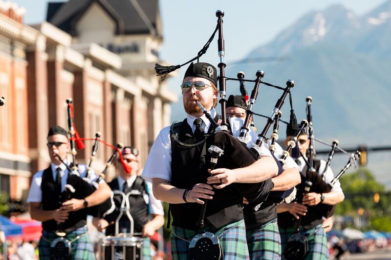 Bagpipers play the bagpipes at the Grand Parade in Provo on Tuesday.