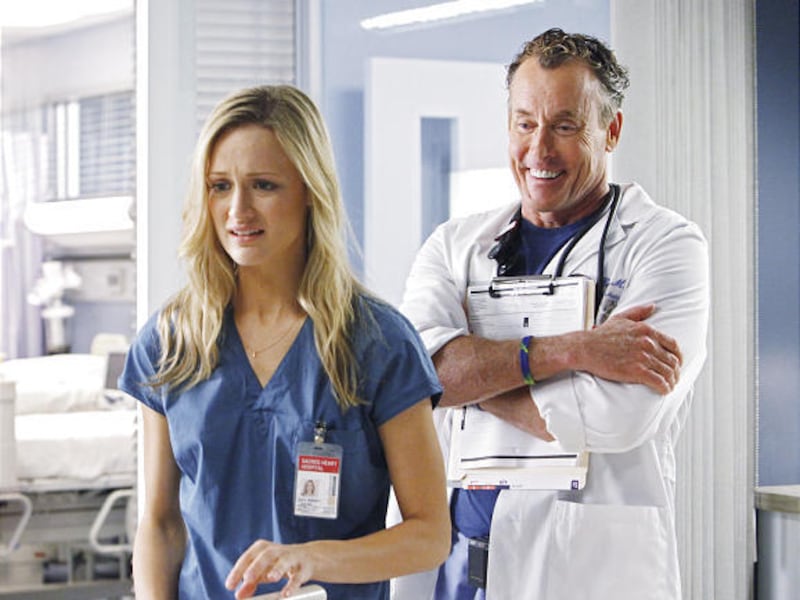 Dr. Cox (John C. McGinley) is delighted to have a new med student to torture — the hapless Lucy (Kerry Bishe) — on "Scrubs."