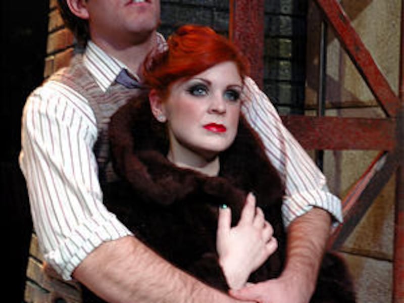 Jon Brady Copier as Clifford Bradshaw and Ginger Bess as Sally Bowles in Egyptian Theatre Company's production of "Cabaret."