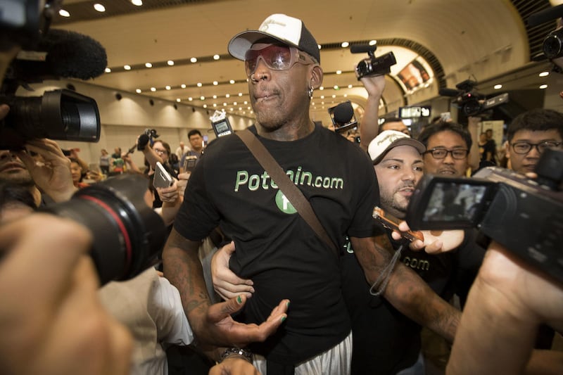 Former NBA basketball player Dennis Rodman arrives at Beijing Capital International Airport in Beijing, Saturday, June 17, 2017, after a flight from Pyongyang. Former NBA star Rodman, vowing to come back again soon, on Saturday wrapped up a low-key and in