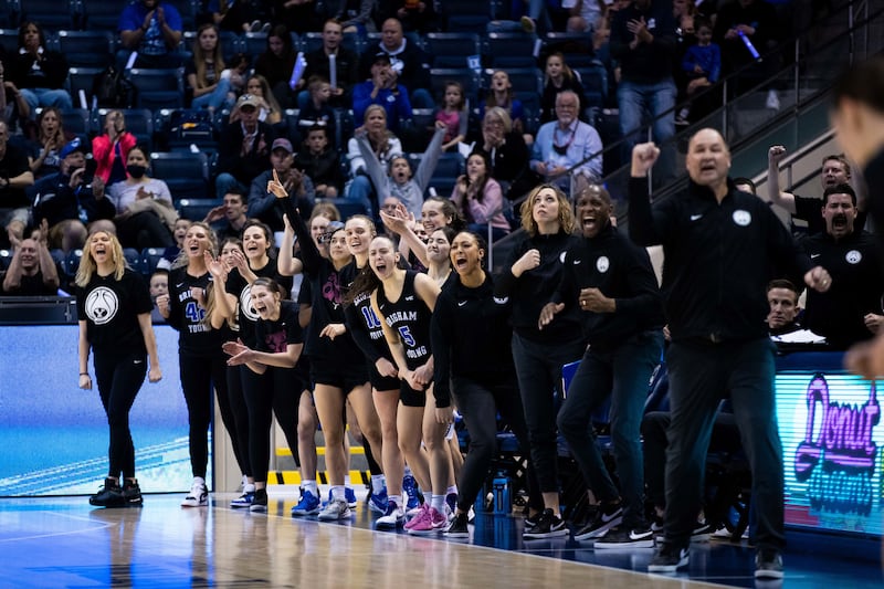 BYU’s Jeff Judkins and players cheer from the sideline during the Cougars’ victory over Gonzaga Feb. 19, 2022, in Provo.