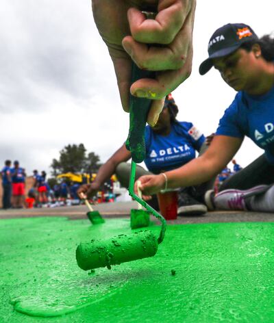 Volunteers from Delta Air Lines, Utah Community Action and the community join KaBOOM! in transforming an empty site into a kid-designed, state-of-the-art playground at James R. Russell Head Start in Salt Lake City on Saturday, July 14, 2018. The new playg