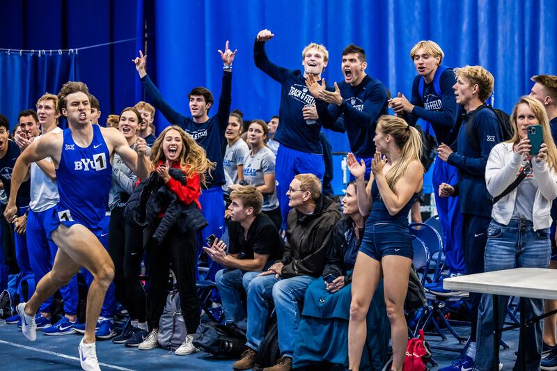BYU athletes cheer on their teammates during event at the December Invitational.