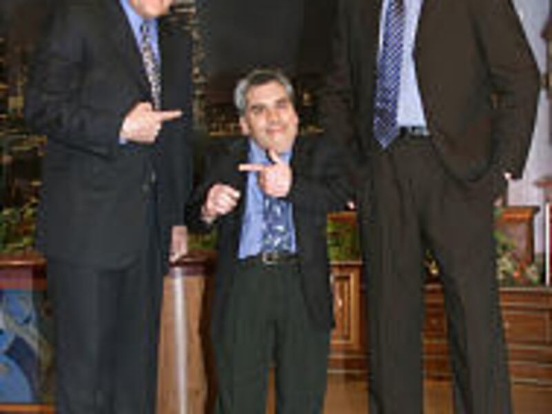 "Tonight Show" host Jay Leno, "Little Jay" and "Late Night" host Conan O'Brien during a 2001 appearance on Leno's show.