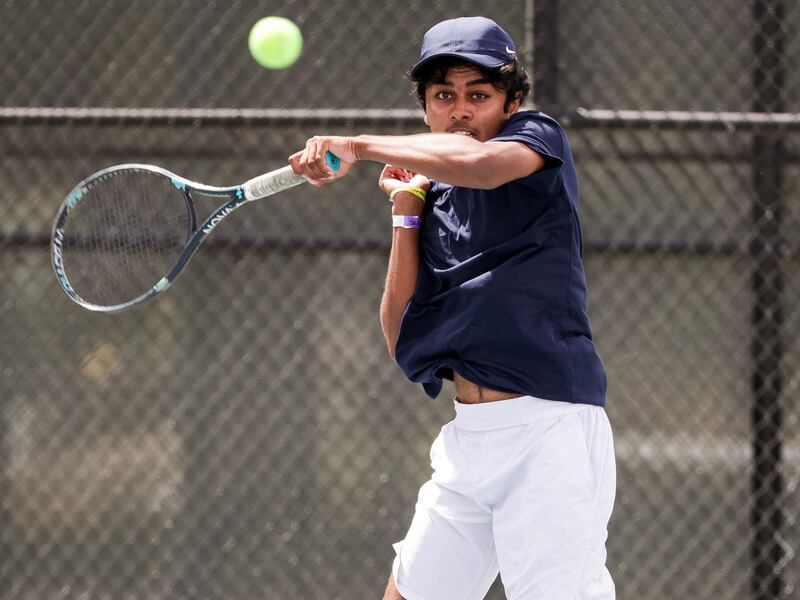Waterford’s Lalith Suresh returns the ball in the No. 1 singles championship match of the 3A boys state tennis tournament on May 22, 2021.