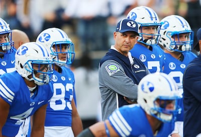 Offensive coordinator Ty Detmer looks as BYU and USU prepare to play at Maverik Stadium in Logan Utah on Friday, Sept. 29, 2017.