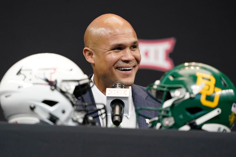 Baylor head coach Dave Aranda smiles while speaking at the NCAA college football Big 12 media days in Arlington, Texas.