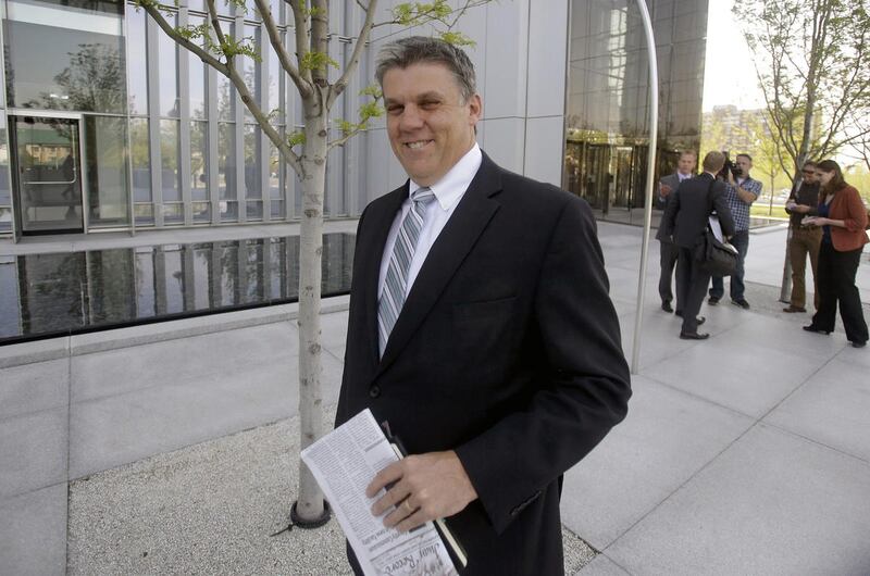 In this April 22, 2015, file photo, San Juan County Commissioner Phil Lyman leaves the federal courthouse in Salt Lake City.