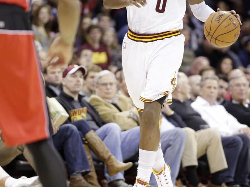 Cleveland Cavaliers' C.J. Miles (0) brings the ball up against the Toronto Raptors in an NBA basketball game Tuesday, Dec. 18, 2012, in Cleveland. (AP Photo/Mark Duncan)