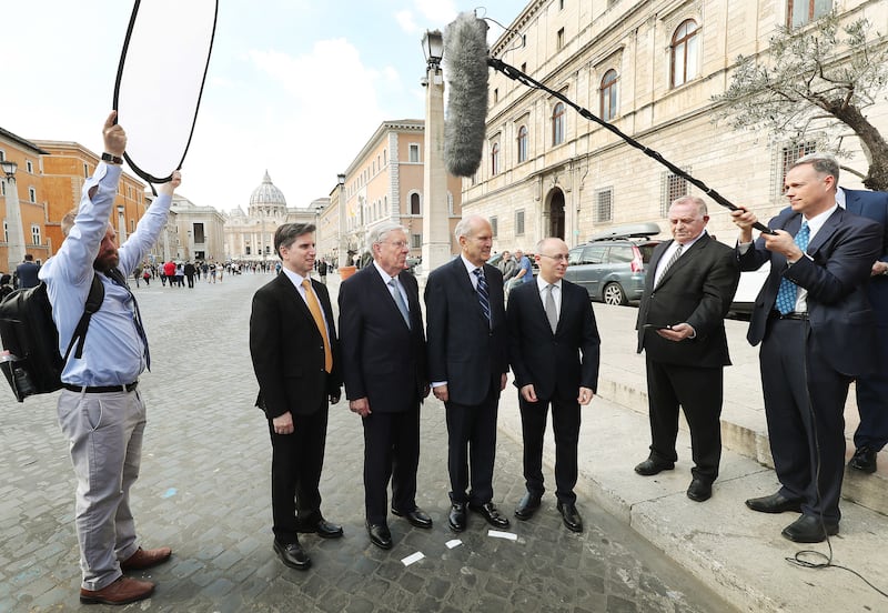 President Russell M. Nelson of The Church of Jesus Christ of Latter-day Saints and President M. Russell Ballard, president of the Quorum of the Twelve Apostles, Elder Massimo De Feo, General Authority Seventy, left, and Elder Alessandro Dini Ciacci, Area Seventy, right, are interviewed by media near the Vatican in Rome, Italy, on Saturday, March 9, 2019 after meeting with Pope Francis.