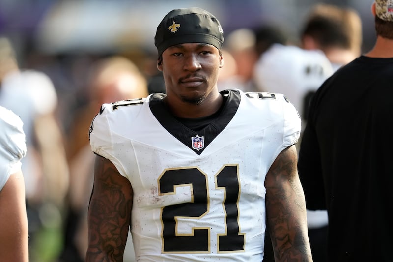 New Orleans Saints running back Jamaal Williams (21) looks on before an NFL football game against the Minnesota Vikings, Sunday, Nov. 12, 2023, in Minneapolis. (AP Photo/Abbie Parr)