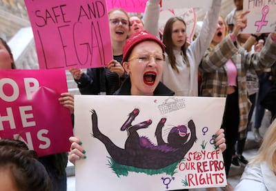 Louise Holbrook cheers during a rally against abortion bans as part of Stop the Bans Day of Action at the Capitol in Salt Lake City on Tuesday, May 21, 2019.