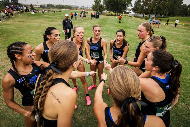Members of the BYU women's cross-country team huddle up prior to the Big 12 championships in Waco, Texas, Nov. 1, 2024. The No. 1-ranked Cougars will compete in the the NCAA championships Saturday morning in Wisconsin.