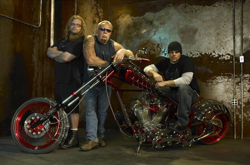 In this 2009 publicity image released by TLC, The Teutuls, from left, Mikey Teutul, Paul Teutul Sr., and Paul Teutul Jr., from the TLC series, "American Chopper," are shown.