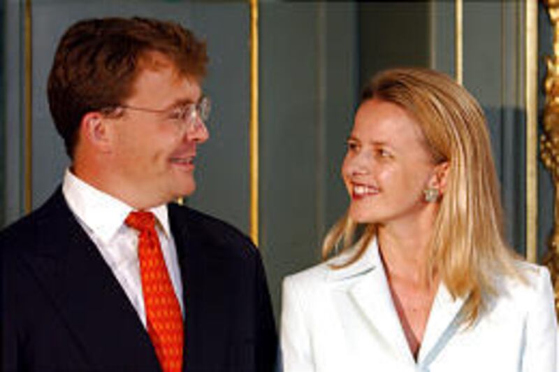 Dutch Prince Johan Friso, here with his fiancee Mabel Wisse Smit, renounced his claim to the throne Friday to marry Smit, embroiled in a controversy over a long-ago relationship with a known Dutch gangster.