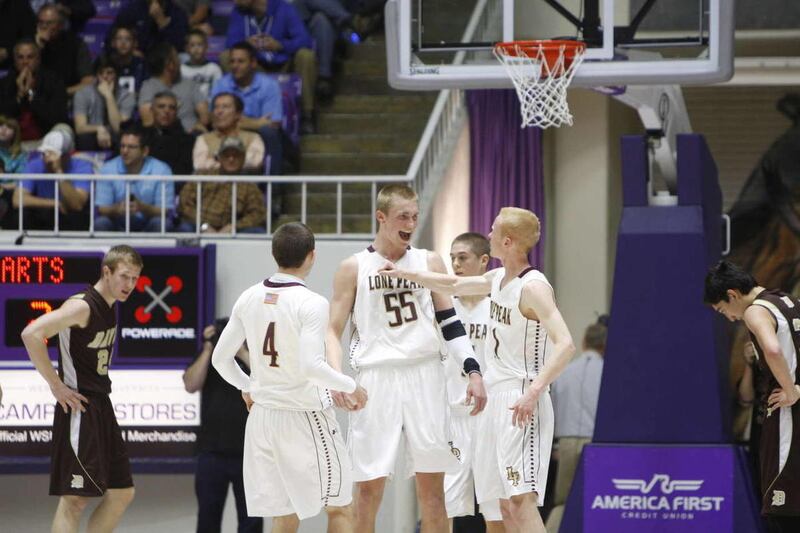 as Lone Peak High School defeats Davis High School in the state 5A quarterfinals basketball tournament Wednesday, Feb. 27, 2013, in Ogden.