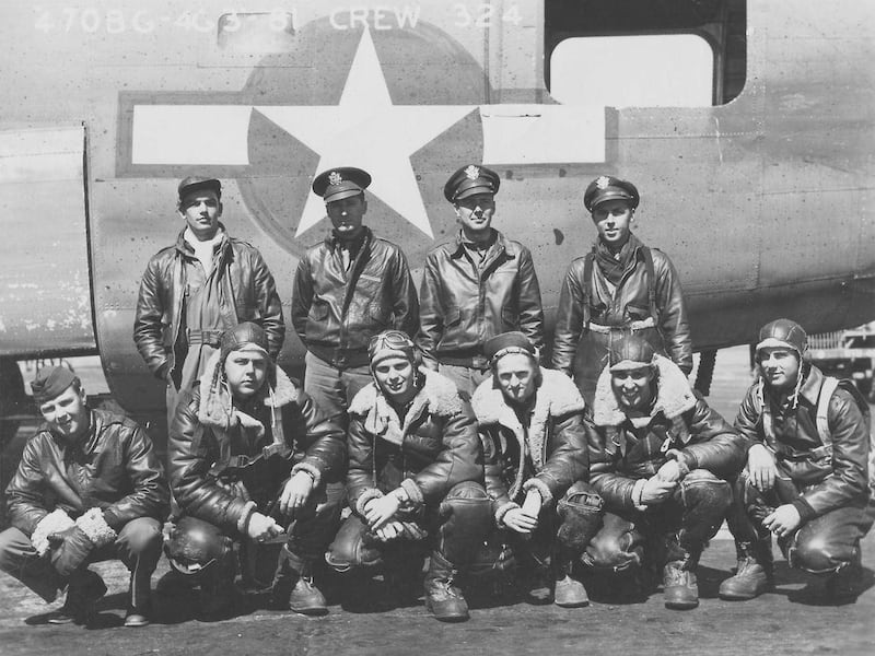 **ADVANCE FOR THE WEEKEND OF JUNE 4-5 AND THEREAFTER** In a World War II photo provided by Charles Ware, Ware, front, third from the left, is pictured with his B-24 bonber crew during World War II. Ware served as a nose gunner on B-24 Liberator airplanes