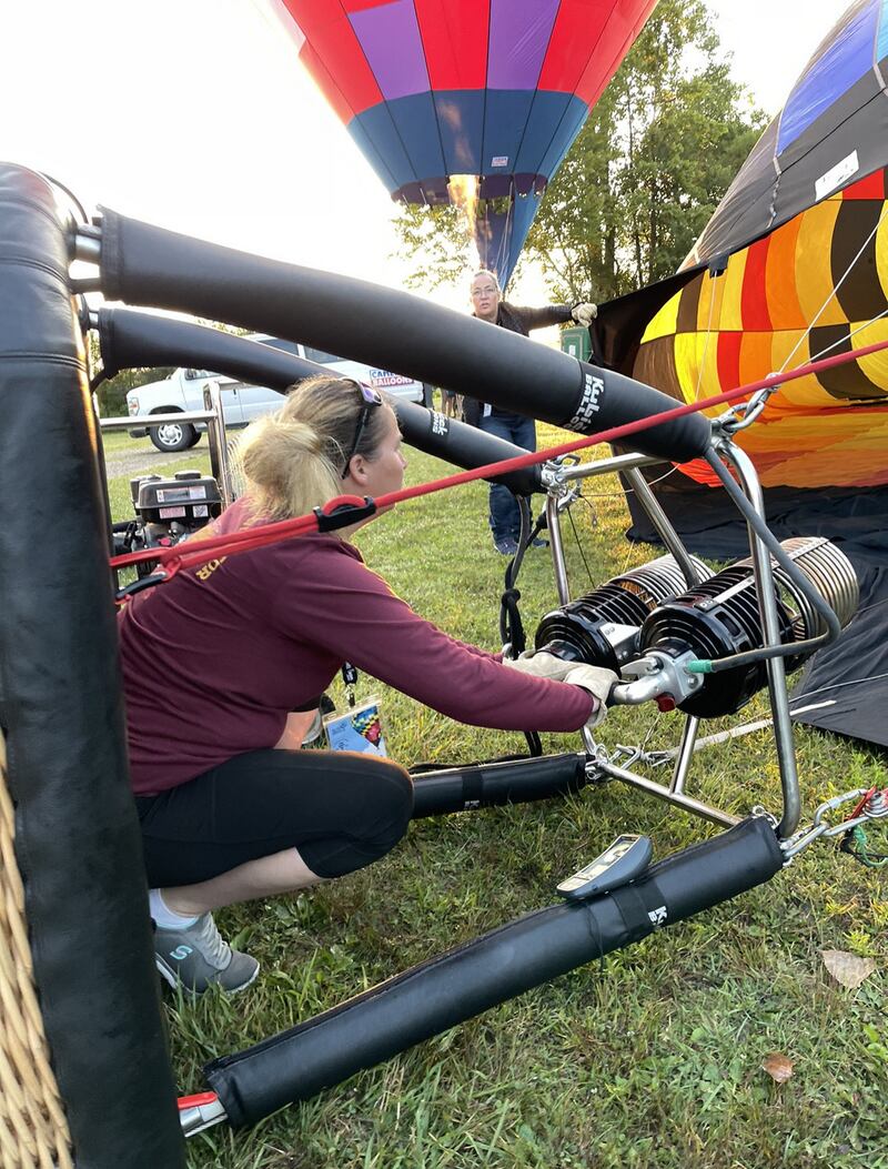 Kimberly Whiteman, of Kamas, operates her hot air balloon during the Women's National Championship in Jackson, Missouri, in July.