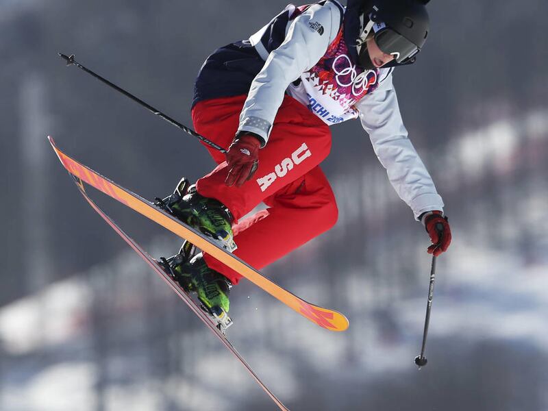 Julia Krass of the United States takes a jump during ski slopestyle training at the Rosa Khutor Extreme Park ahead of the 2014 Winter Olympics, Friday, Feb. 7, 2014, in Krasnaya Polyana, Russia. (AP Photo/Sergei Grits)