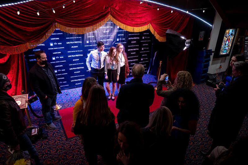 People stand on the red carpet at the LDS Film Festival, which is scheduled for March 2-5 at the SCERA Center for the Arts in Orem, Utah.