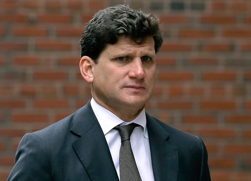 Gordon Caplan, right, arrives at federal court, Thursday, Oct. 3, 2019, in Boston, for sentencing in a nationwide college admissions bribery scandal. (AP Photo/Steven Senne)