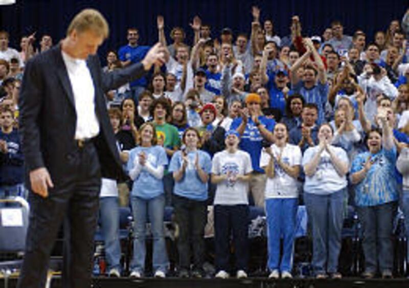 Former Indiana State star Larry Bird acknowledges the student section at ceremony in his honor.