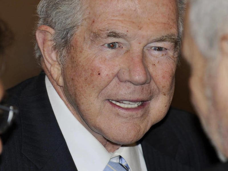 FILE - In this Saturday, Jan. 16, 2010 file picture, Rev. Pat Robertson talks to attendees at a prayer breakfast as part of inaugural ceremonies for Virginia Gov.-elect Bob Mcdonnell at the Capitol in Richmond, Va. Televangelist and one time presidential