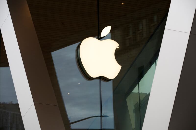 In this Saturday, March 14, 2020 file photo, an Apple logo adorns the facade of the downtown Brooklyn Apple store in New York. Epic Games said Tuesday March 30, 2021, it filed a complaint about Apple to the U.K. competition watchdog, which is investigating the iPhone maker over concerns it has a dominant position in app distribution.