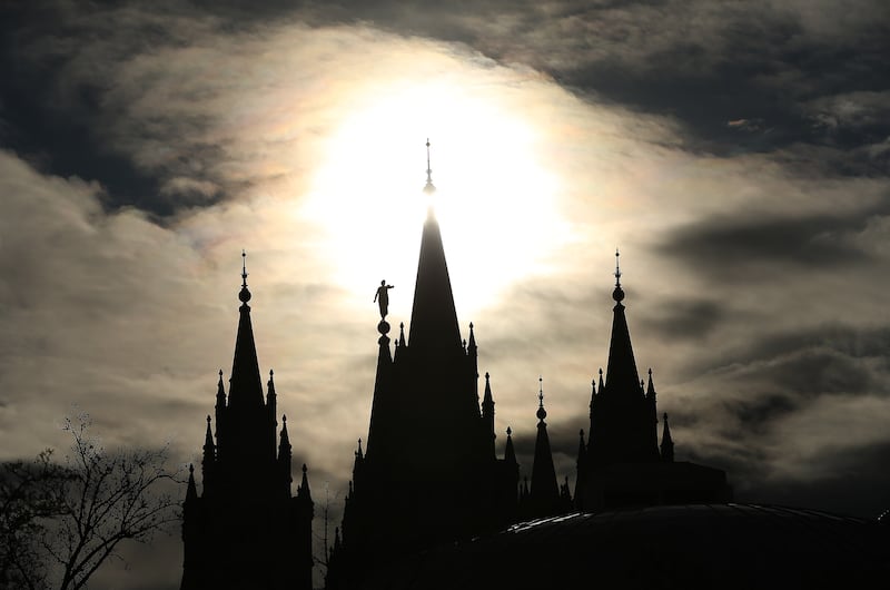 The Salt Lake Temple is surrounded by rain clouds during the 189th Annual General Conference of The Church of Jesus Christ of Latter-day Saints in Salt Lake City on April 6, 2019.