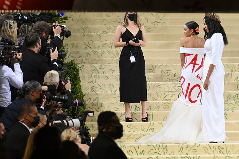 Rep. Alexandria Ocasio-Cortez, D-N.Y., wears a dress emblazoned with the words “Tax the Rich” at the 2021 Met Gala in New York, N.Y.