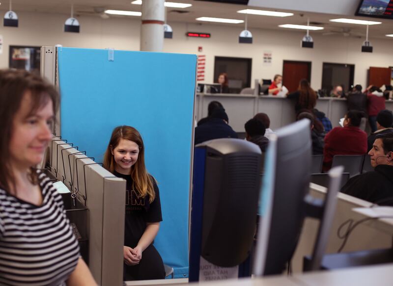 Nyla Parks has her photograph taken for her driver's license at the driver license division in West Valley City on Wednesday, Jan. 30, 2019.
