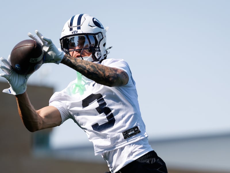 BYU receiver Kyler Kasper catches a pass during the first day of fall camp Wednesday, Aug. 5, 2026, in Provo.