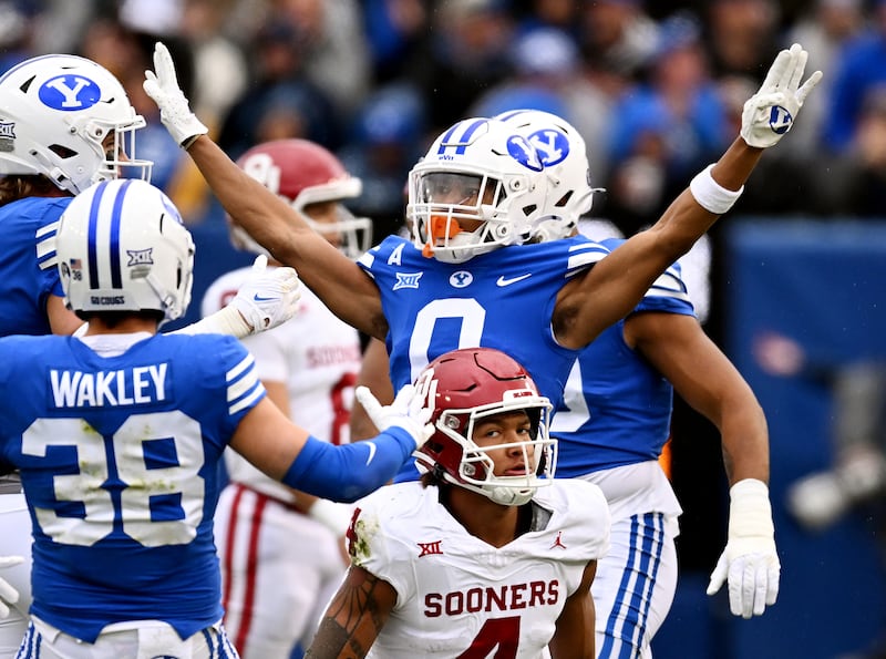 BYU cornerback Jakob Robinson (0) celebrates after a defensive stop during game against at LaVell Edwards Stadium.