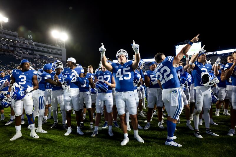 BYU players celebrate their 14-0 win over the Sam Houston Bearkats on Saturday, Sept. 2, 2023.