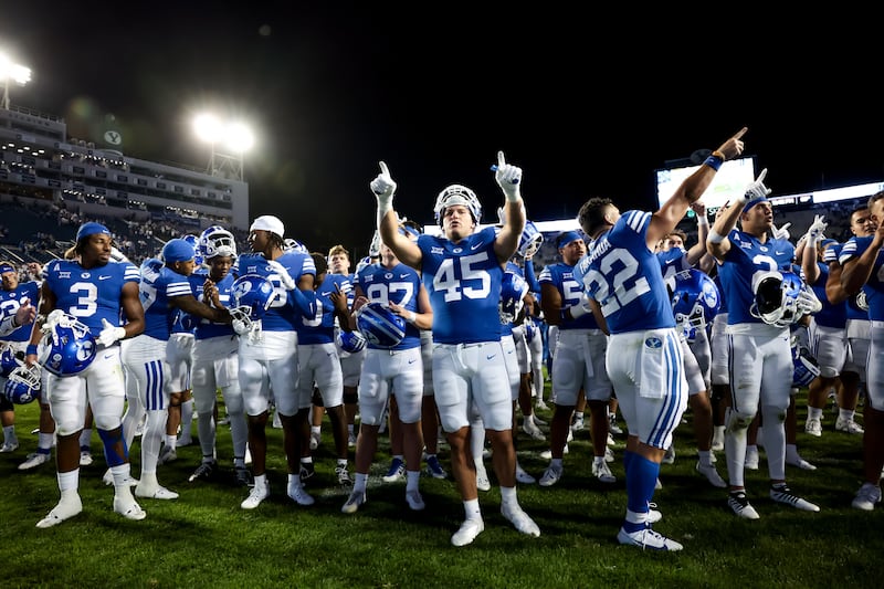 BYU players celebrate their 14-0 win over the Sam Houston Bearkats on Saturday, Sept. 2, 2023.
