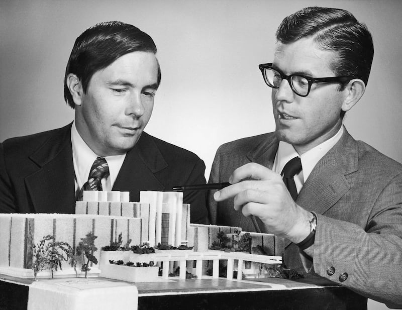 The dean of BYU’s proposed law school, Rex Lee, left, and BYU administrator Bruce Hafen study a model of the law building in 1971.