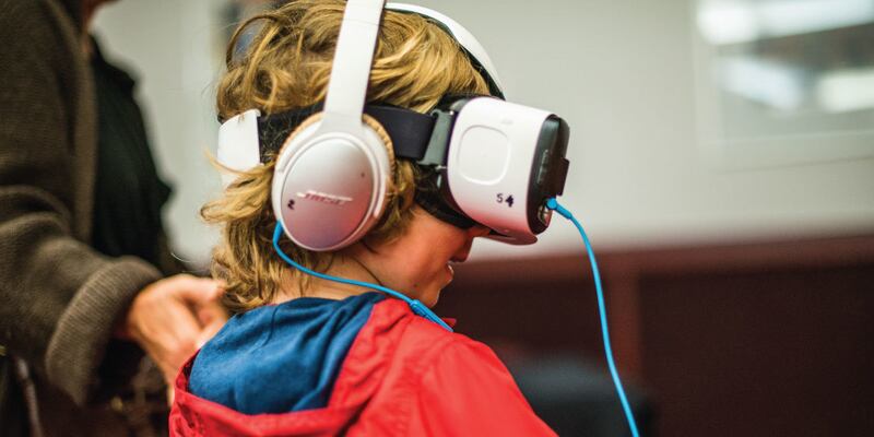 A child enjoys virtual reality at the clubhouse as part of the Tumbleweeds Film Festival.