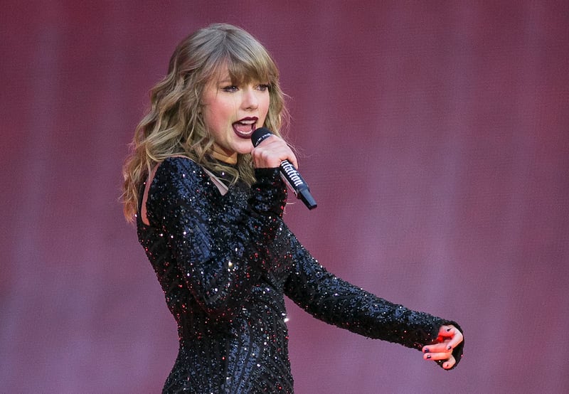 Singer Taylor Swift performs on stage in a concert at London’s Wembley Stadium in 2018.