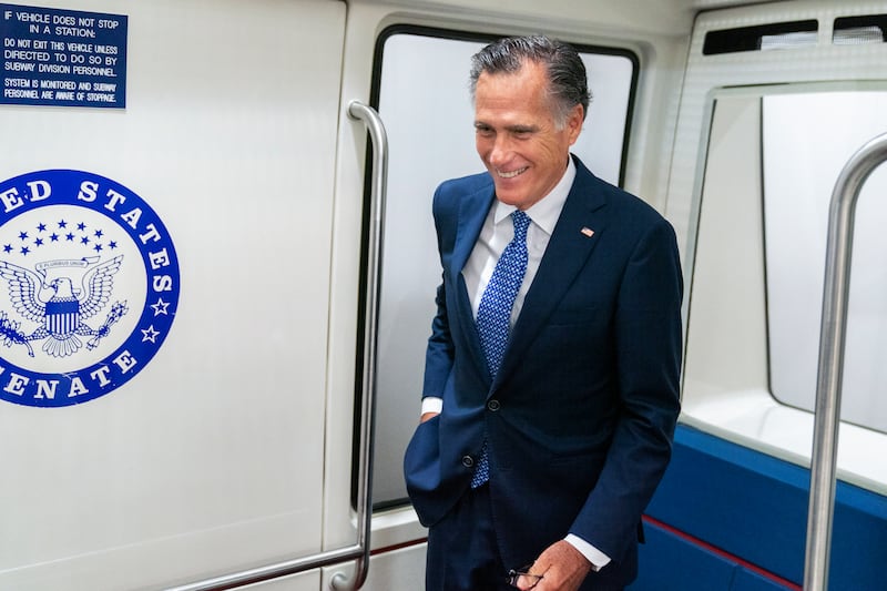 Sen. Mitt Romney, R-Utah, takes the Senate subway on Capitol Hill.