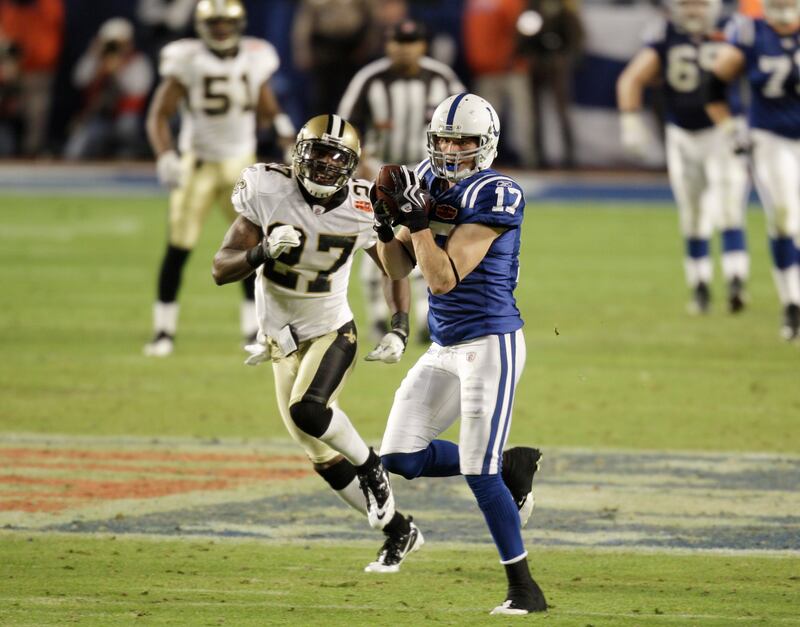 Indianapolis Colts wide receiver Austin Collie (17) is chased by New Orleans Saints cornerback Malcolm Jenkins (27) during the second half of the NFL Super Bowl XLIV football game in Miami, Sunday, Feb. 7, 2010.