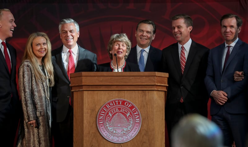 Karen Huntsman, center, is surrounded by family members during a press conference at the University of Utah’s Park Building in Salt Lake City on Nov. 4, 2019, where the Huntsman family announced a $150 million commitment to establish the Huntsman Mental Health Institute at the U. The funding, pledged over 15 years, will be used to support research, expand access to patient care and build awareness about mental health.