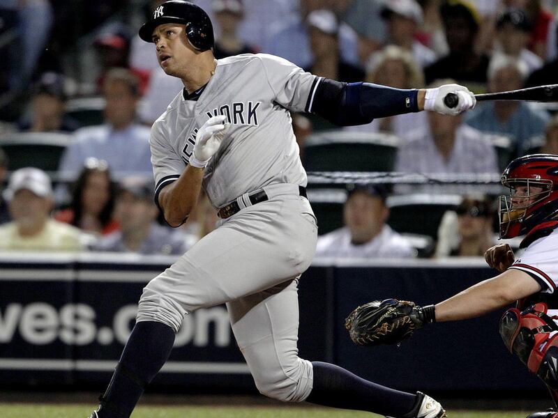 New York Yankees' Alex Rodriguez watches his grand slam in the eighth inning of a baseball game against the Atlanta Braves on Tuesday, June 12, 2012, in Atlanta. (AP Photo/David Goldman)