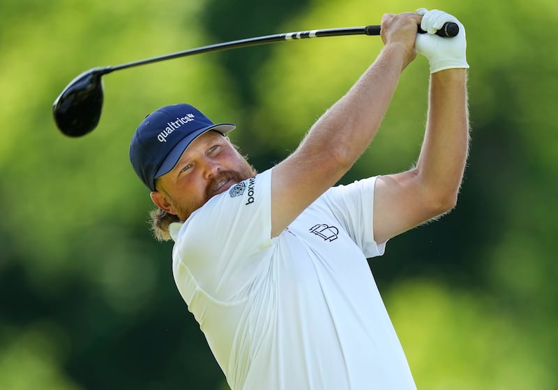 Zac Blair tees off on the fourth hole during the third round of Canadian Open golf tournament in Hamilton, Ontario, Saturday, June 1, 2024. (Nathan Denette/The Canadian Press via AP)