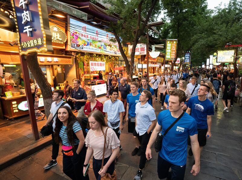 Members of the BYU Spectacular cast visit the Muslim Market in Xi'an, China, on May 27, 2019.