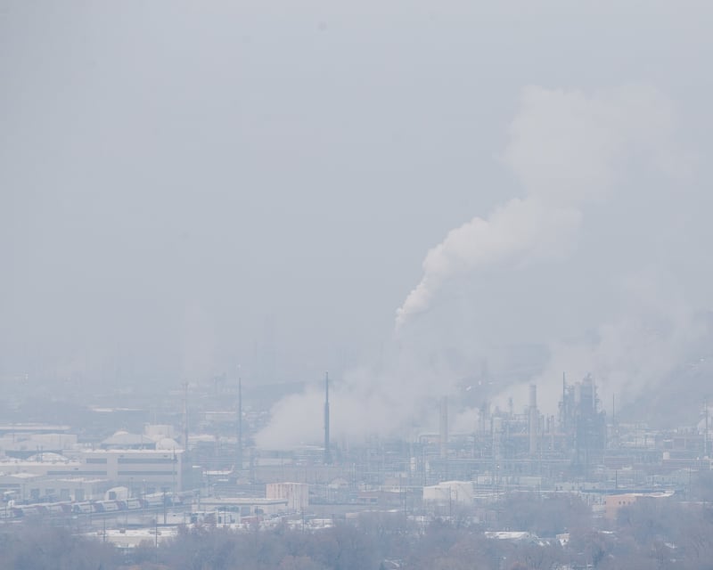 Smog covers Salt Lake City as an inversion lingers on Saturday, Dec. 8, 2018.