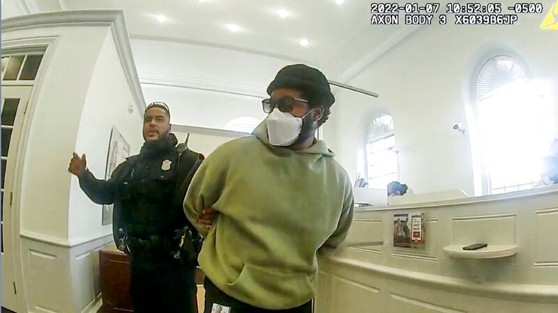 A police officer detains “Black Panther” director Ryan Coogler.