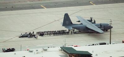 The casket of Draper Battalion Chief Matt Burchett is carried to the waiting hearse at the Roland R. Wright Air National Guard Base in Salt Lake City on Wednesday, Aug. 15, 2018. Burchett was killed while fighting the Mendocino Complex Fire north of San F